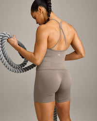 EnhanceLift™ Seamless Strappy Racer Vest with Built in Bra Shelf with Grey Logo | Warm Minky