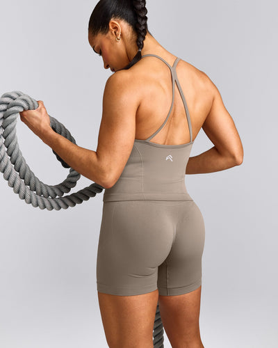 EnhanceLift™ Seamless Strappy Racer Tank Top with Built in Bra Shelf with Grey Logo | Warm Minky