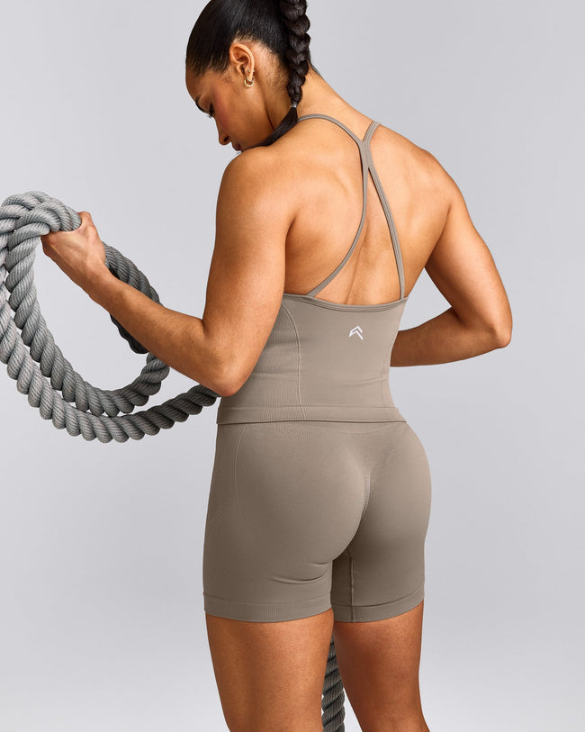 EnhanceLift™ Seamless Strappy Racer Tank Top with Built in Bra Shelf with Grey Logo | Warm Minky