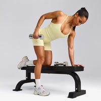 EnhanceLift™ Seamless Strappy Racer Tank Top with Built in Bra Shelf with Grey Logo | Pastel Yellow