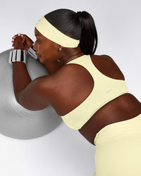 SoftMotion™ Bralette with Grey Logo | Pastel Yellow