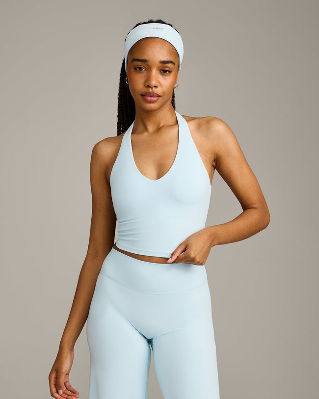 SoftMotion™ Halter Neck Mid Vest with Built in Bra Shelf with Grey Logo | Cloud Blue