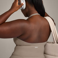 SoftMotion™ Halter Neck Mid Vest with Built in Bra Shelf with Grey Logo | Minky