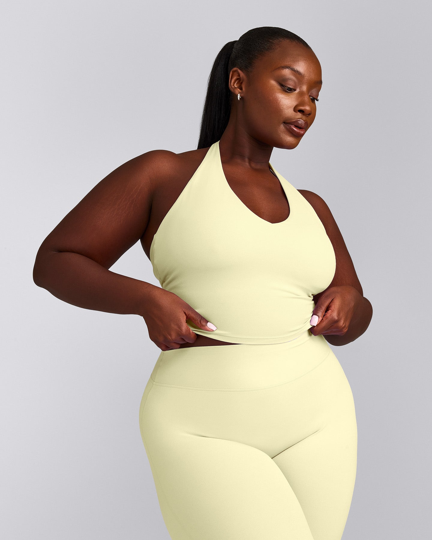 SoftMotion™ Halter Neck Mid Tank Top with Built in Bra Shelf with Grey Logo | Pastel Yellow