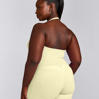 SoftMotion™ Halter Neck Mid Tank Top with Built in Bra Shelf with Grey Logo | Pastel Yellow