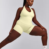 SoftMotion™ Halter Neck Tank Top with Built in Bra Shelf with Grey Logo | Pastel Yellow