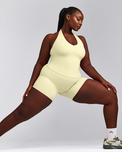 SoftMotion™ Halter Neck Tank Top with Built in Bra Shelf with Grey Logo | Pastel Yellow
