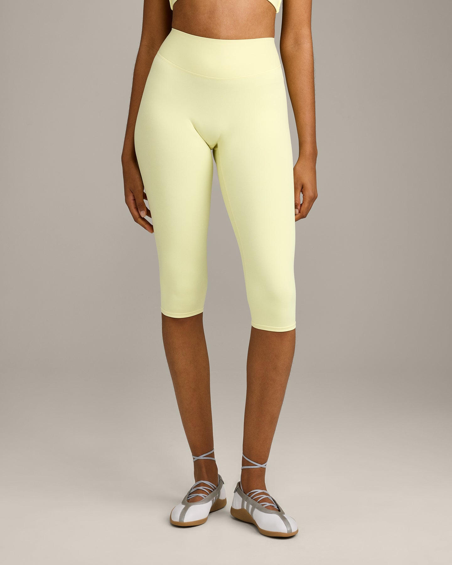 SoftMotion™ High Waisted Capri Leggings with Grey Logo | Pastel Yellow
