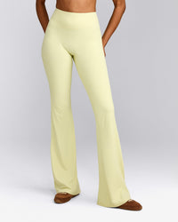 SoftMotion™ Flared Pants with Grey Logo | Pastel Yellow