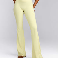 SoftMotion™ Flared Pants with Grey Logo | Pastel Yellow