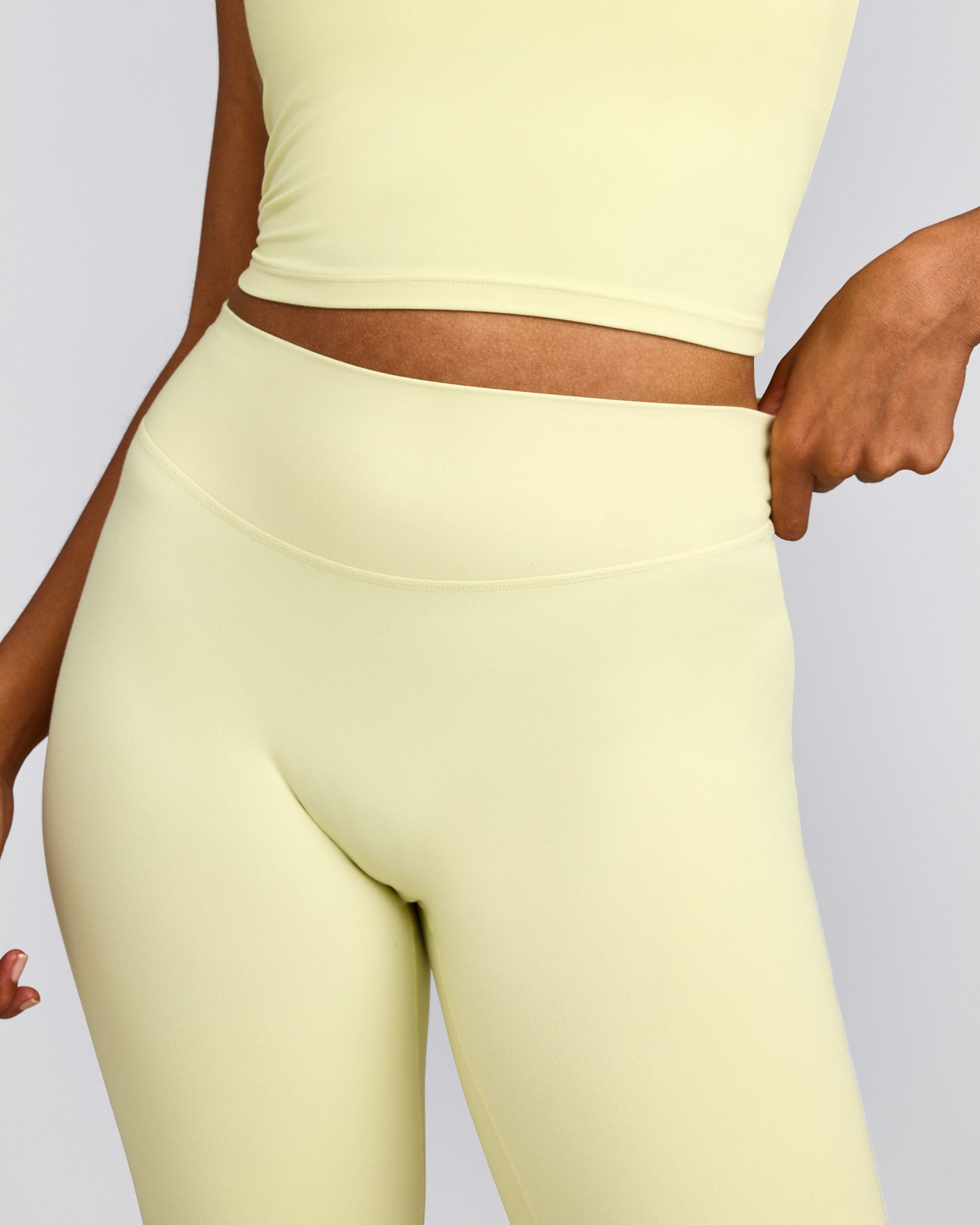 SoftMotion™ Flared Pants with Grey Logo | Pastel Yellow