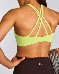 EasyLift™ High Neck Sports Bra with Grey Logo | Citrus Green