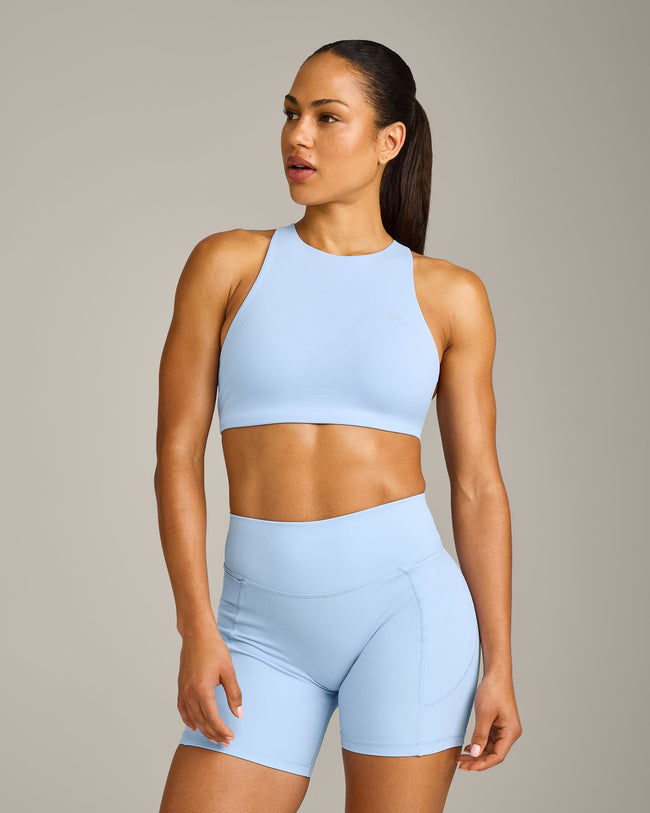EasyLift™ High Neck Sports Bra with Grey Logo | Powdered Blue