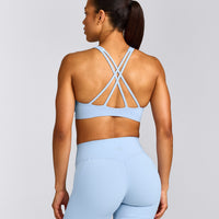 EasyLift™ High Neck Sports Bra with Grey Logo | Powdered Blue
