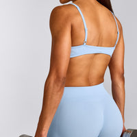 EnhanceLift™ Seamless Minimal Bralette with Grey Logo | Powdered Blue