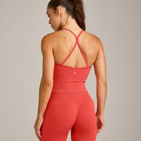 EnhanceLift™ Seamless Strappy Racer Vest with Built in Bra Shelf with Grey Logo | Dark Charged Coral