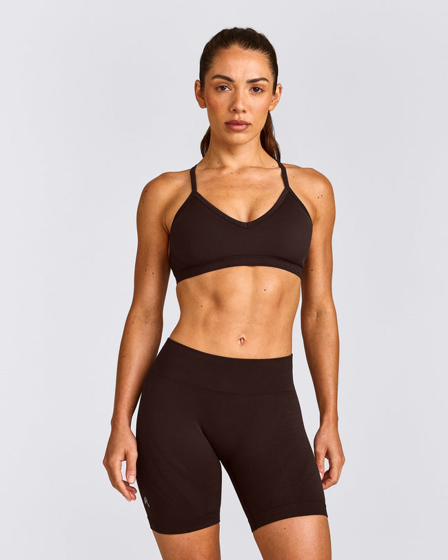 EnhanceLift™ Seamless Strappy Sports Bra with Grey Logo | 70% Cocoa