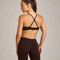 EnhanceLift™ Seamless Strappy Sports Bra with Grey Logo | 70% Cocoa