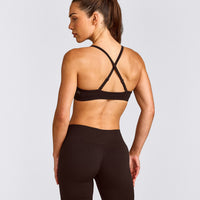 EnhanceLift™ Seamless Strappy Sports Bra with Grey Logo | 70% Cocoa