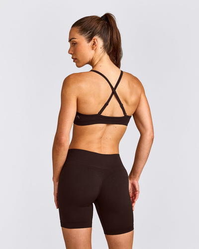 EnhanceLift™ Seamless Strappy Sports Bra with Grey Logo | 70% Cocoa