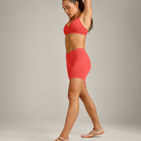 EnhanceLift™ Seamless Strappy Sports Bra with Grey Logo | Dark Charged Coral