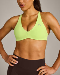 UnifiedMove™ Cross Back Sports Bra with Reflective Logo | Citrus Green