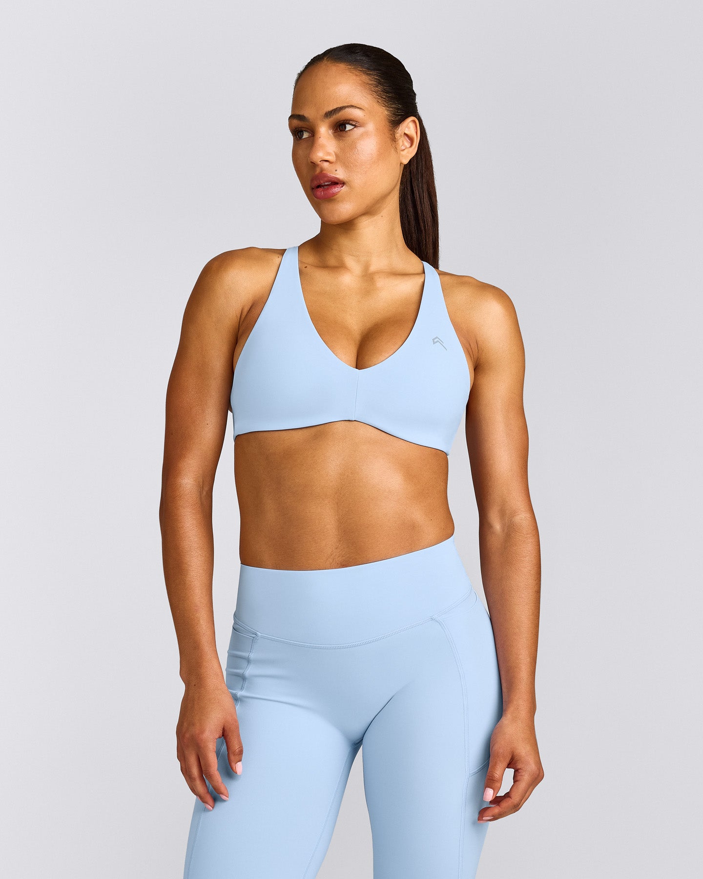 UnifiedMove™ Cross Back Sports Bra with Reflective Logo | Powdered Blue