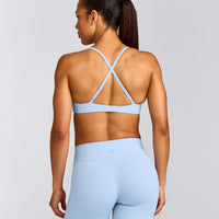 UnifiedMove™ Cross Back Sports Bra with Reflective Logo | Powdered Blue