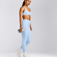 UnifiedMove™ Cross Back Sports Bra with Reflective Logo | Powdered Blue