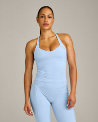 UnifiedMove™ T Back Mid Vest with Built in Bra Shelf with Reflective Logo | Powdered Blue