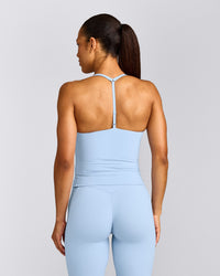 UnifiedMove™ T Back Mid Vest with Built in Bra Shelf with Reflective Logo | Powdered Blue