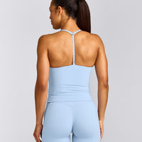 UnifiedMove™ T Back Mid Vest with Built in Bra Shelf with Reflective Logo | Powdered Blue