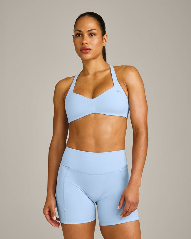 UnifiedMove™ T Back Minimal Bralette with Reflective Logo | Powdered Blue