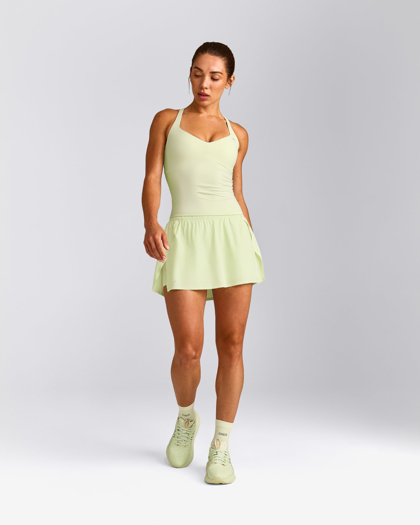 UnifiedMove™ T Back Mid Tank Top with Built in Bra Shelf | Meadow Mist Green