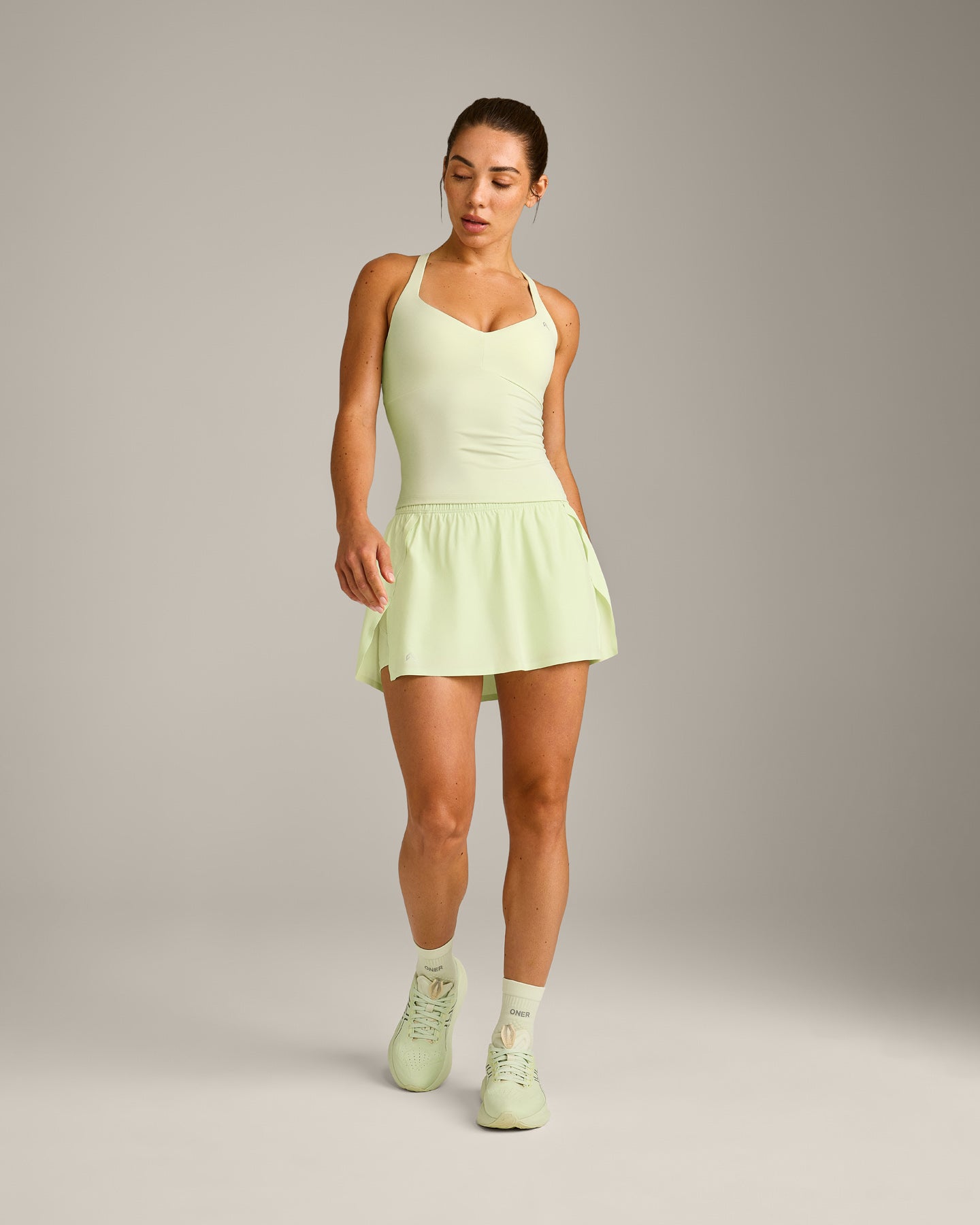 UnifiedMove™ T Back Mid Vest with Built in Bra Shelf New Branding | Meadow Mist Green