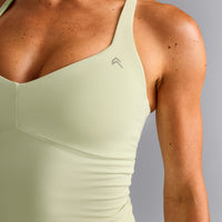 UnifiedMove™ T Back Mid Tank Top with Built in Bra Shelf | Meadow Mist Green