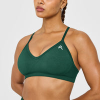 EnhanceLift™ Seamless Strappy Sports Bra with White Logo | Racing Green