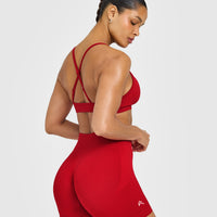 EnhanceLift™ Seamless Strappy Sports Bra with White Logo | Light Toasted Red