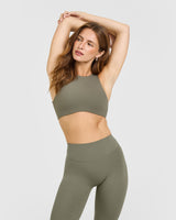 SoftMotion™ High Neck Sports Bra with White Logo | Alpine Green