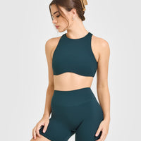 SoftMotion™ High Neck Sports Bra with White Logo | Oil Blue