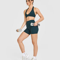 SoftMotion™ Minimal Halter Neck Bralette with White Logo | Oil Blue