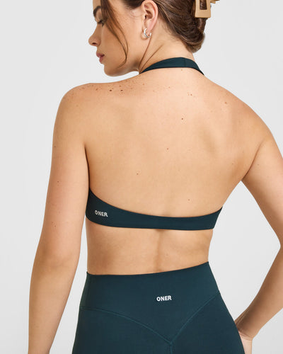 SoftMotion™ Minimal Halter Neck Bralette with White Logo | Oil Blue