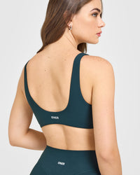 SoftMotion™ Scoop Back Bralette with White Logo | Oil Blue