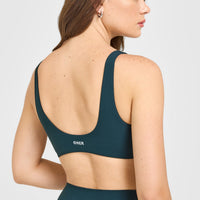 SoftMotion™ Scoop Back Bralette with White Logo | Oil Blue