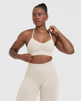 Effortless Strappy Bralette with White Logo | Sand